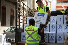 Työntekijät purkavat WFP:n ruoka-avustusta Beirutissa, Libanonissa - WFP/ Ziad Rizkallah